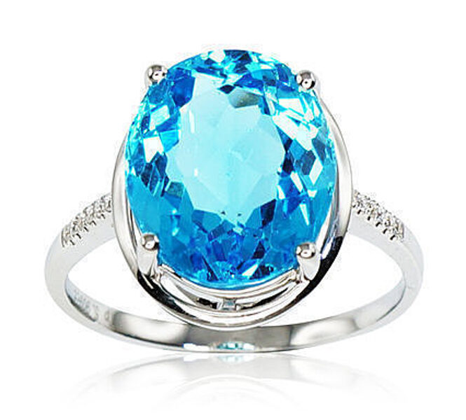 Baltā zelta gredzens ar briljantiem un topāzu